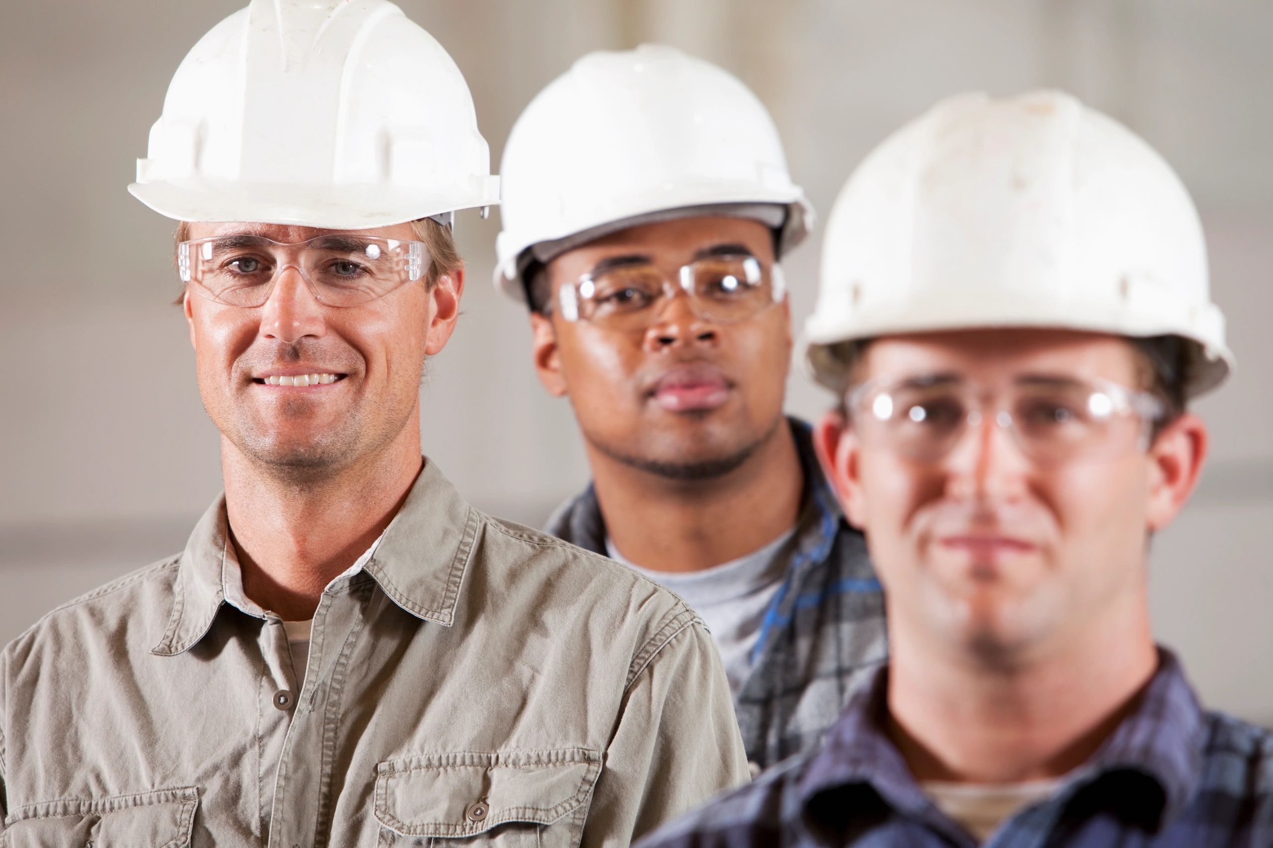 blue collar branded t-shirts hats hoodies staff group photo warehouse